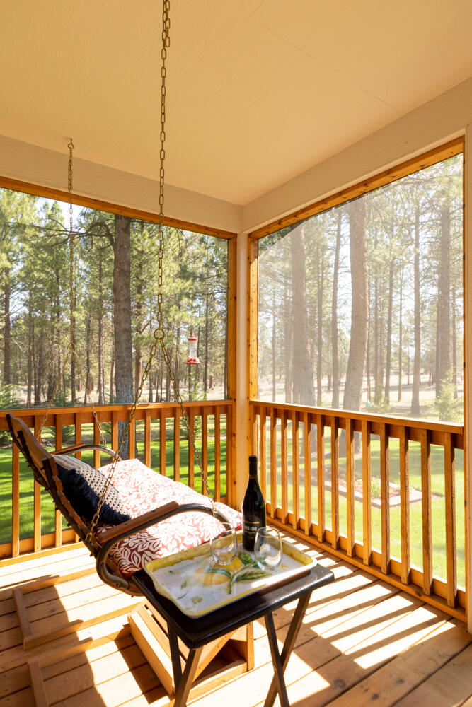 9660 Sprague River Road Chiloquin, OR 97624 - Photo 27 of 58 Screened in porch swing