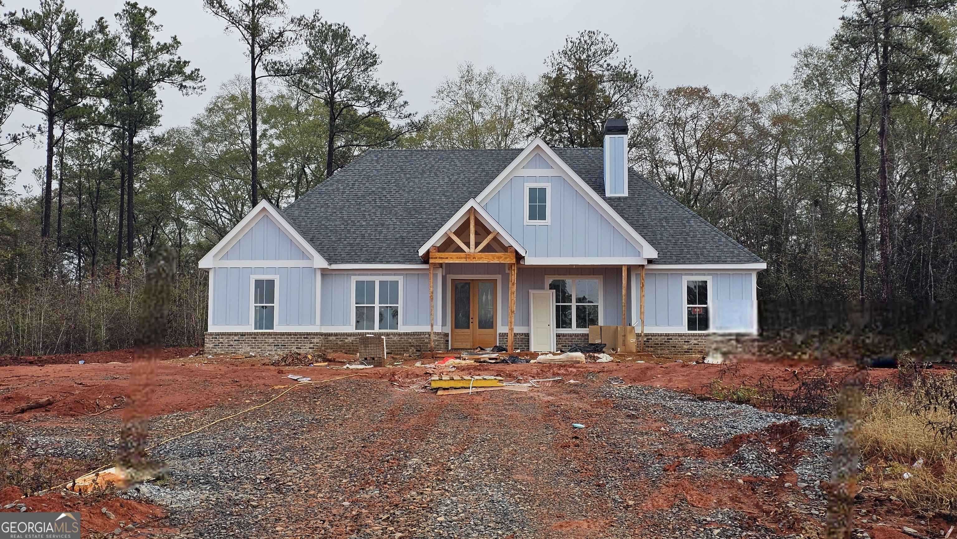 a front view of a house with yard