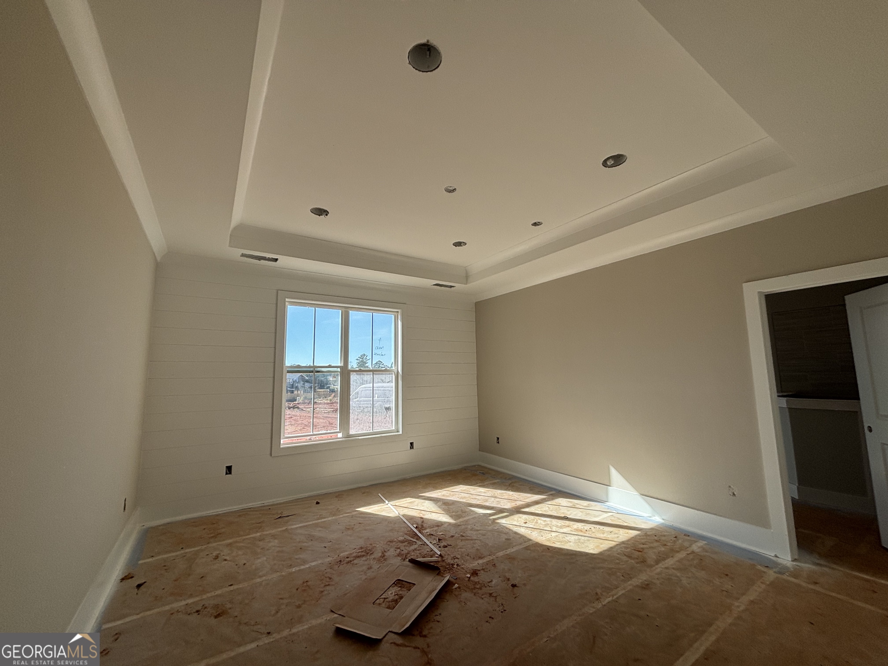 125 Hawthorne Lane Forsyth, GA 31029 - Photo 12 of 19 a view of empty room with wooden floor