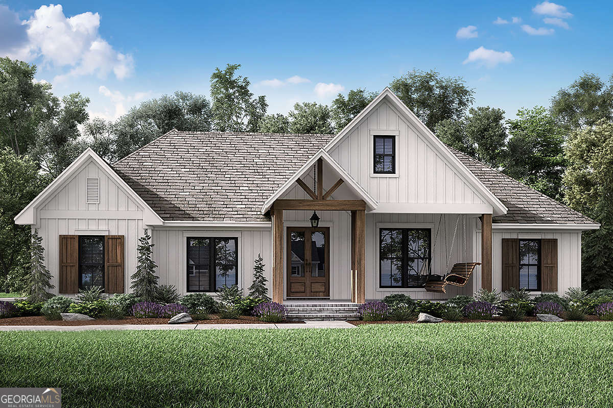 125 Hawthorne Lane Forsyth, GA 31029 - Photo 19 of 19 a front view of a house with a yard and outdoor seating