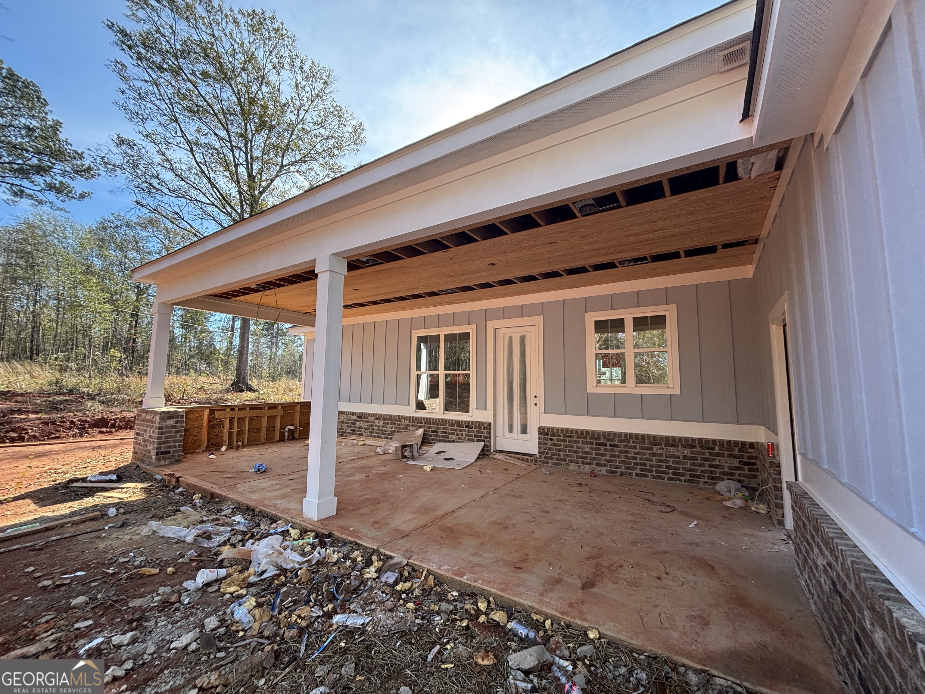 125 Hawthorne Lane Forsyth, GA 31029 - Photo 2 of 19 a backyard of a house with seating space