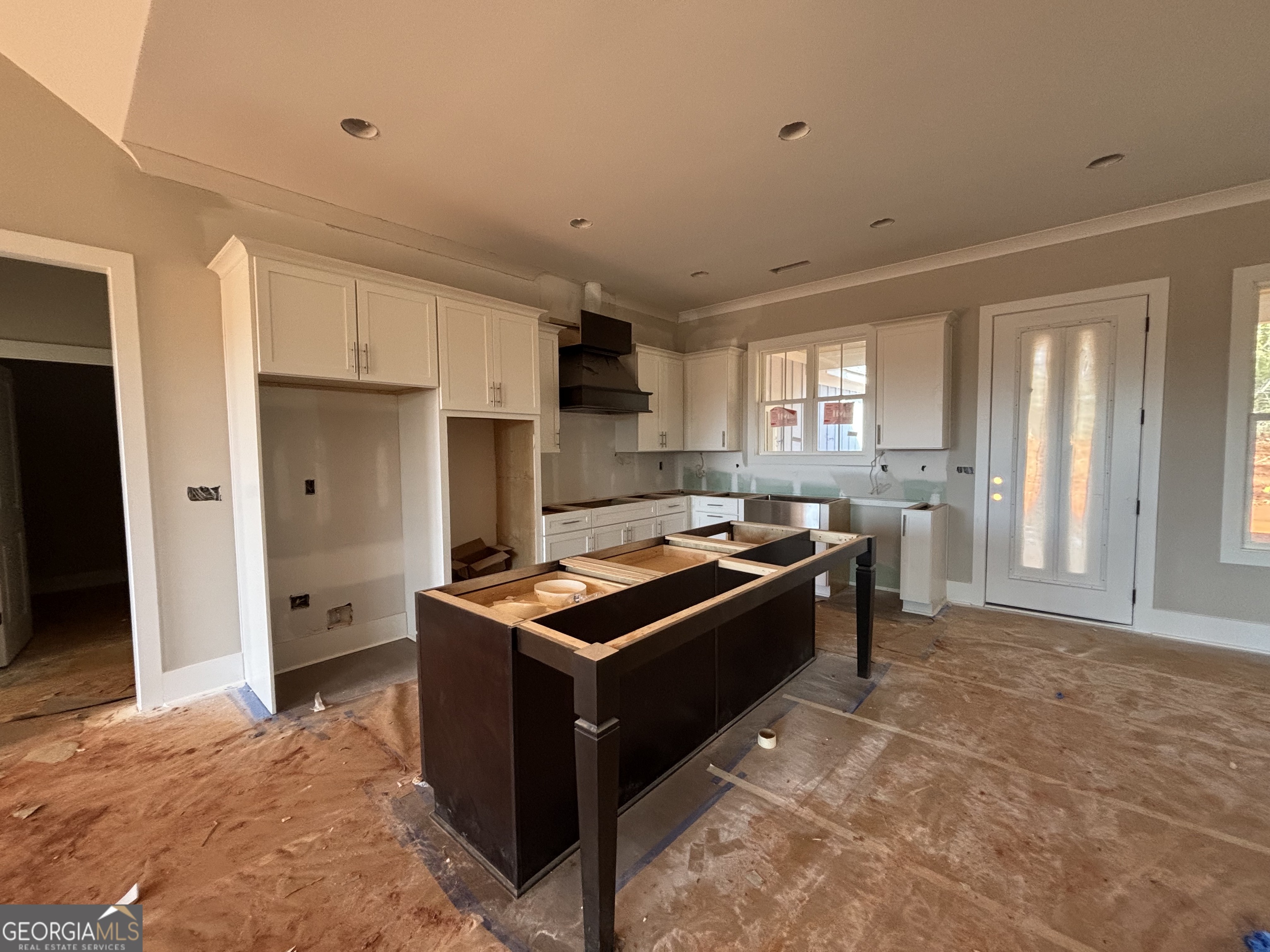 125 Hawthorne Lane Forsyth, GA 31029 - Photo 6 of 19 a kitchen with stainless steel appliances granite countertop a stove a sink dishwasher and a refrigerator