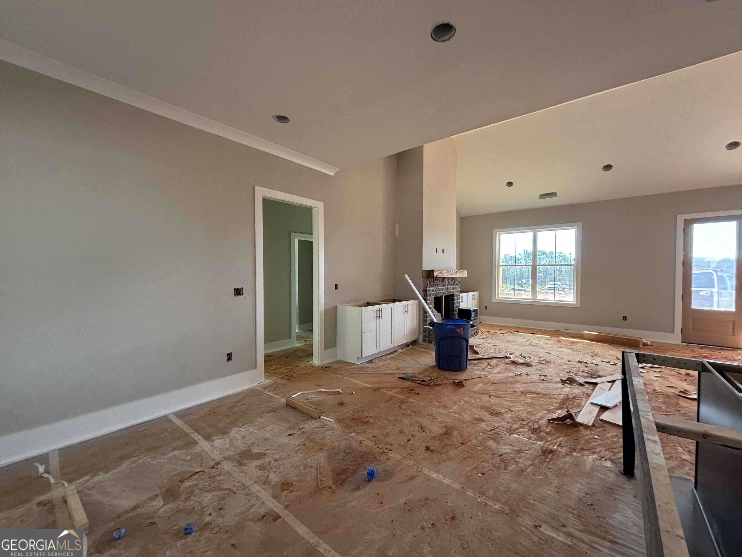 125 Hawthorne Lane Forsyth, GA 31029 - Photo 7 of 19 a view of a workspace with furniture and windows