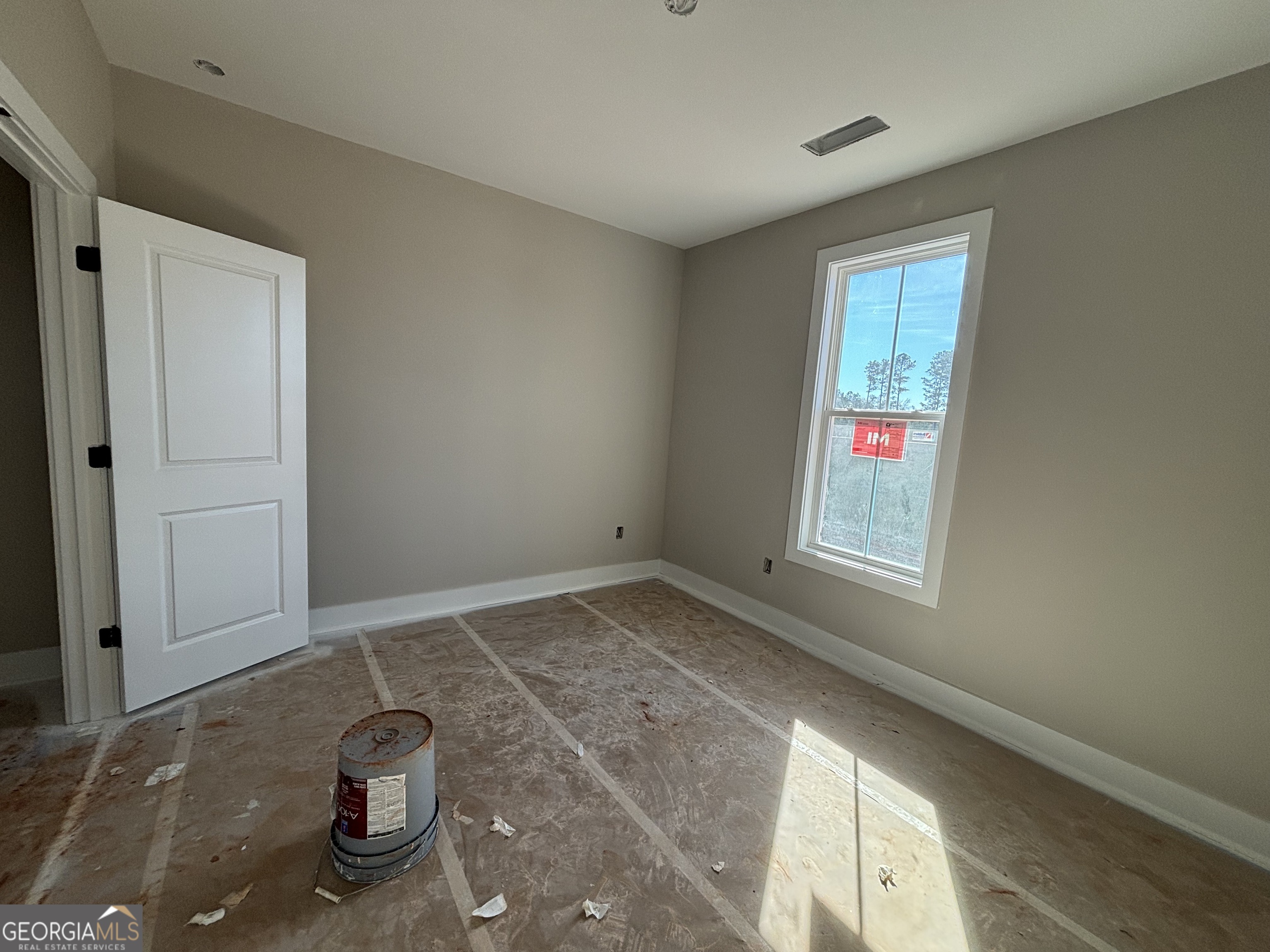 125 Hawthorne Lane Forsyth, GA 31029 - Photo 10 of 19 a view of empty room with window