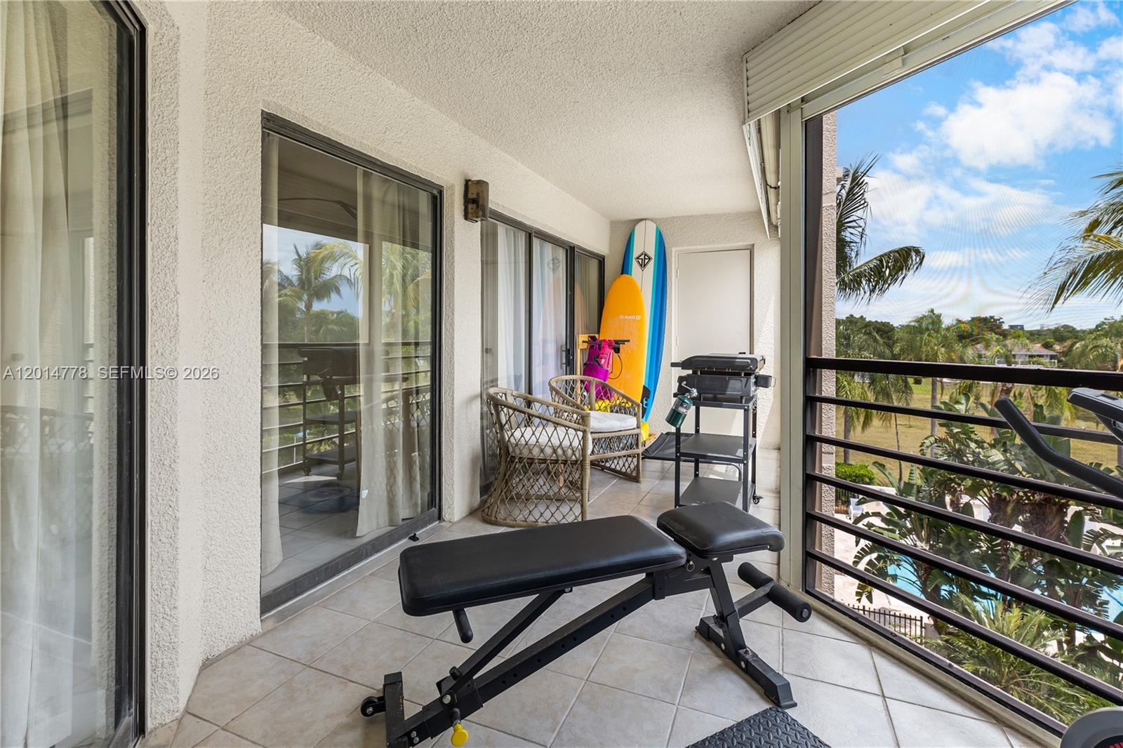5850 Camino Del Sol, Unit 404 Boca Raton, FL 33433 - Photo 34 of 47 a living room with furniture