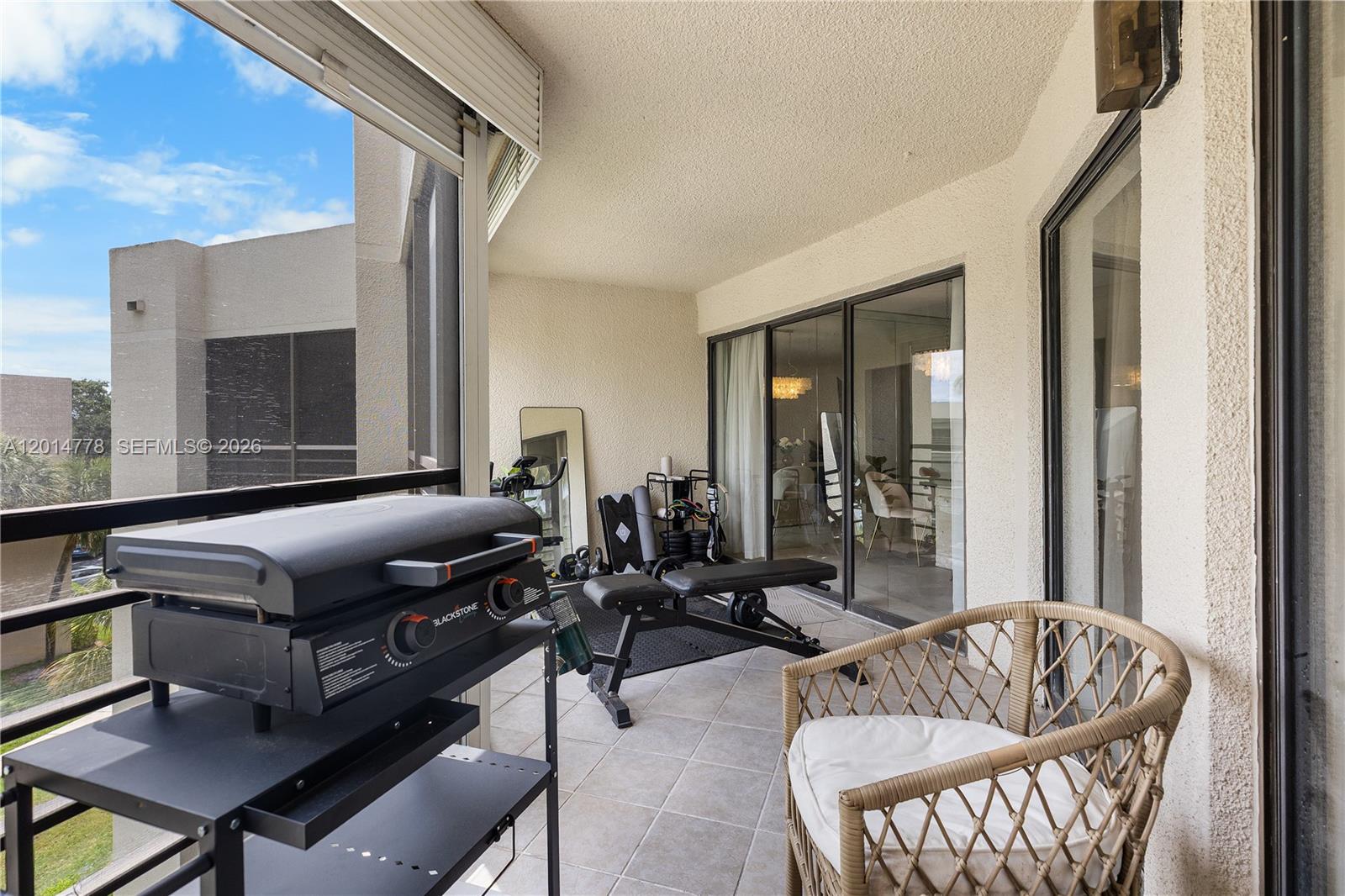 5850 Camino Del Sol, Unit 404 Boca Raton, FL 33433 - Photo 35 of 47 a living room with furniture