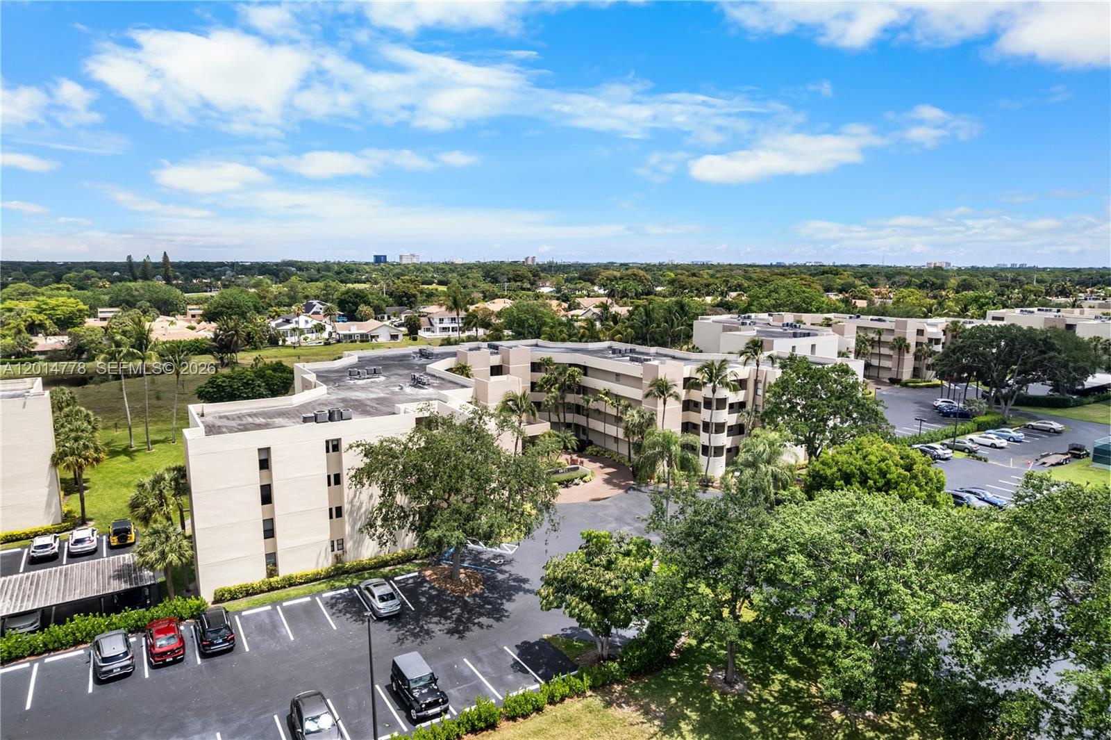 5850 Camino Del Sol, Unit 404 Boca Raton, FL 33433 - Photo 40 of 47 an aerial view of a city