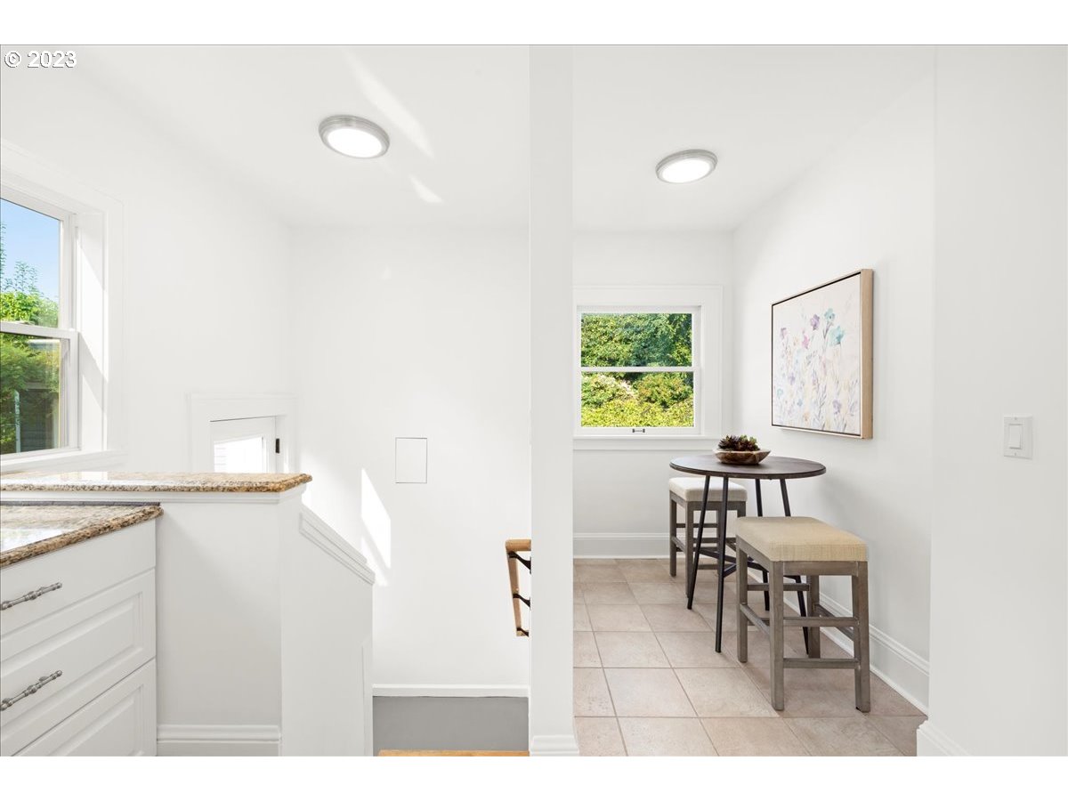 2015 Northeast 38th Avenue Portland, OR 97212 - Photo 17 of 32 a kitchen with a table and chairs in it