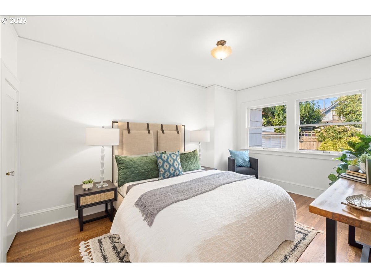 2015 Northeast 38th Avenue Portland, OR 97212 - Photo 18 of 32 a bedroom with a bed and a window