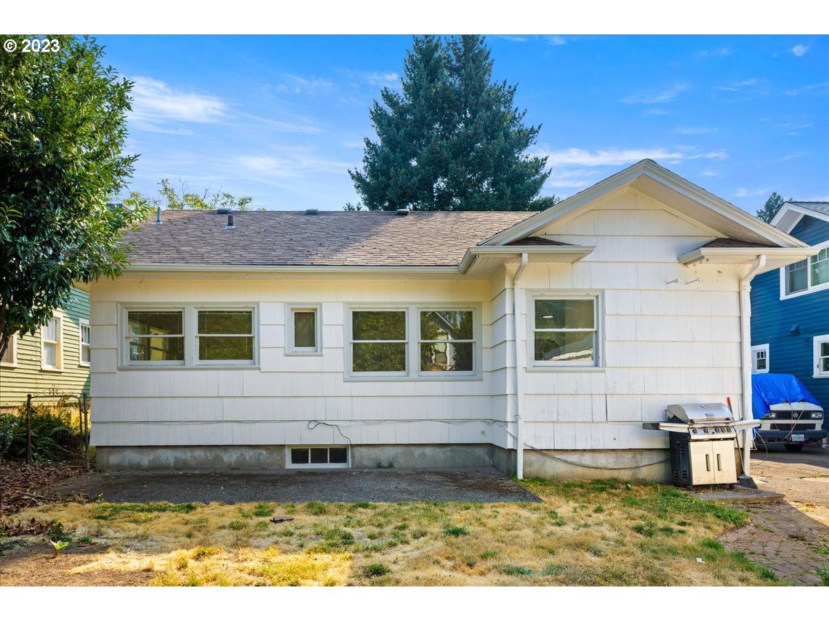 2015 Northeast 38th Avenue Portland, OR 97212 - Photo 31 of 32 a front view of a house with a yard