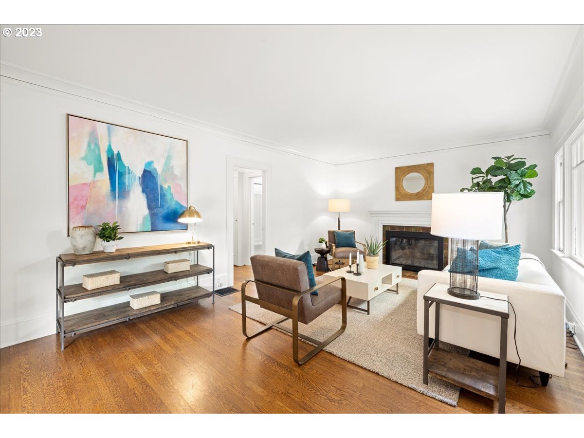 2015 Northeast 38th Avenue Portland, OR 97212 - Photo 6 of 32 a living room with furniture and a wooden floor