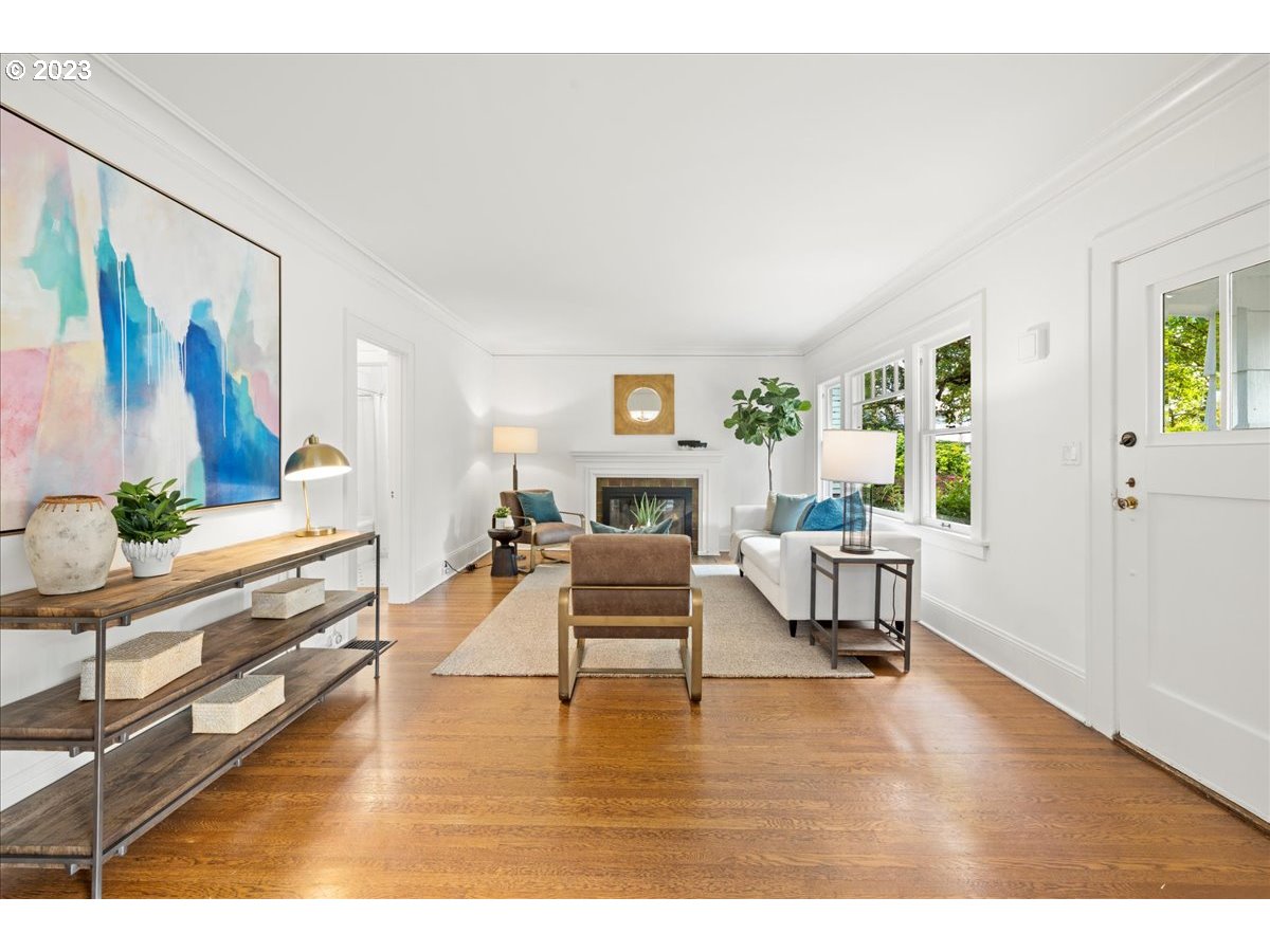 2015 Northeast 38th Avenue Portland, OR 97212 - Photo 7 of 32 a living room with furniture and a fireplace