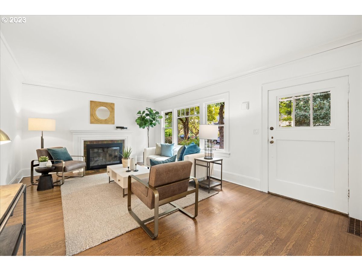 2015 Northeast 38th Avenue Portland, OR 97212 - Photo 8 of 32 a living room with furniture and a fireplace