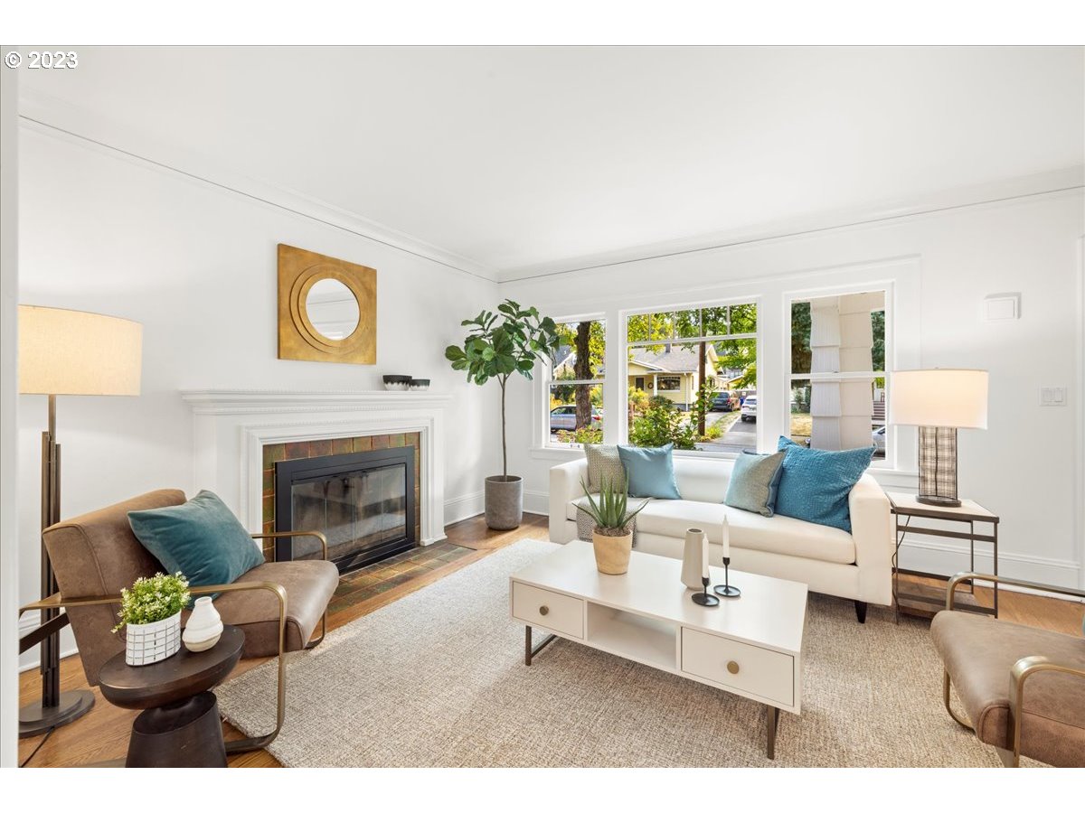 2015 Northeast 38th Avenue Portland, OR 97212 - Photo 9 of 32 a living room with furniture and a fireplace