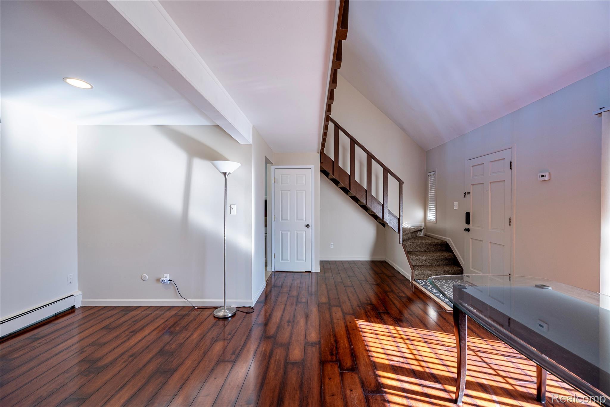 2344 West 14 Mile Road, Unit 7 Royal Oak, MI 48073 - Photo 13 of 23 Great open living and dining space