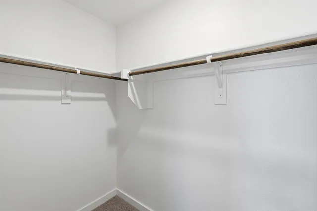 a view of a room with racks on the wall