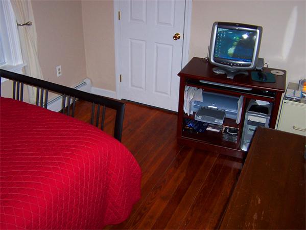 421 East 3rd Street, Unit 2 Boston, MA 02127 - Photo 15 of 25 a living room with furniture and a flat screen tv