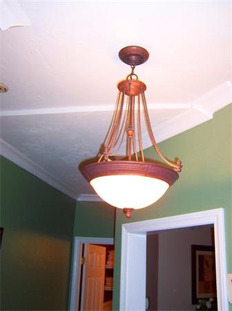 421 East 3rd Street, Unit 2 Boston, MA 02127 - Photo 17 of 25 a room with a table and a potted plant