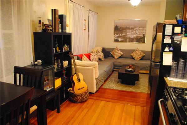 421 East 3rd Street, Unit 2 Boston, MA 02127 - Photo 22 of 25 a living room with furniture and a flat screen tv
