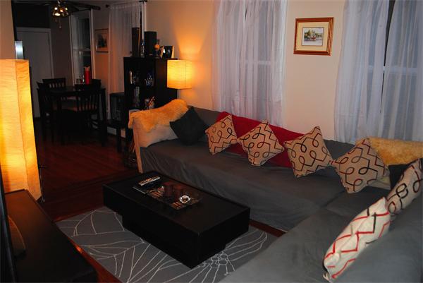 421 East 3rd Street, Unit 2 Boston, MA 02127 - Photo 3 of 25 a living room with furniture and a lamp