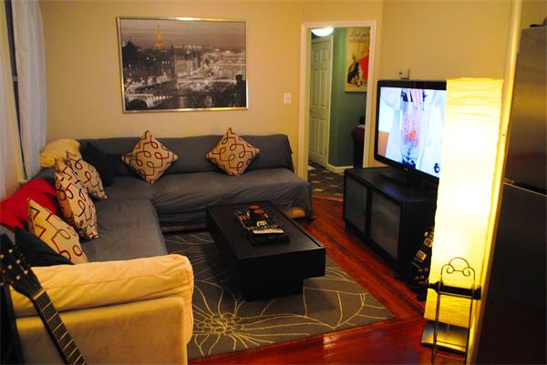 421 East 3rd Street, Unit 2 Boston, MA 02127 - Photo 4 of 25 a living room with furniture and a flat screen tv