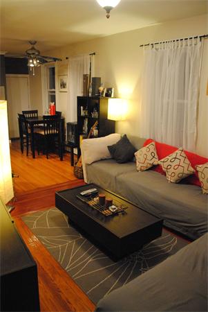 421 East 3rd Street, Unit 2 Boston, MA 02127 - Photo 5 of 25 a living room with furniture and a dining table