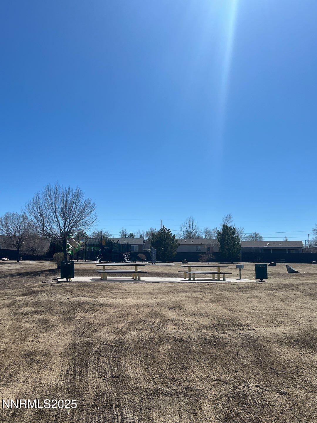 13405 Mt Lassen Street Reno, NV 89506 - Photo 20 of 20 a view of a field with trees in background