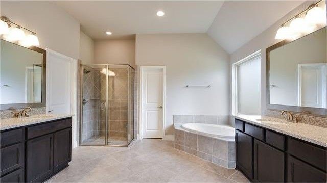 2017 Limestone Lake Drive Georgetown, TX 78633 - Photo 18 of 25 a bathroom with a double vanity sink mirror double and shower