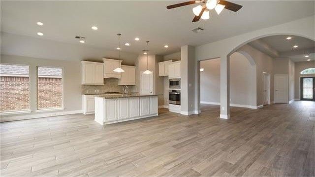 2017 Limestone Lake Drive Georgetown, TX 78633 - Photo 6 of 25 a view of kitchen with refrigerator and window