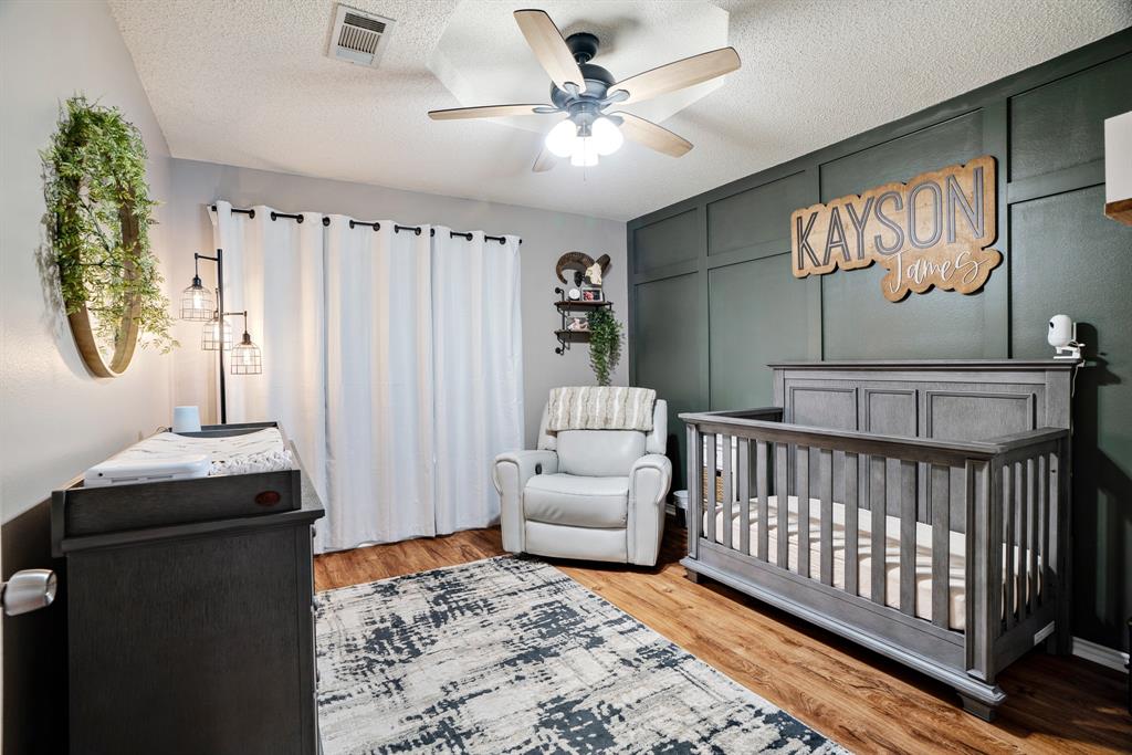 575 Mansfield Road Reno, TX 75462 - Photo 15 of 23 a bedroom with furniture and a window