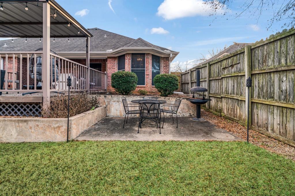 575 Mansfield Road Reno, TX 75462 - Photo 21 of 23 a view of a house with backyard and sitting area