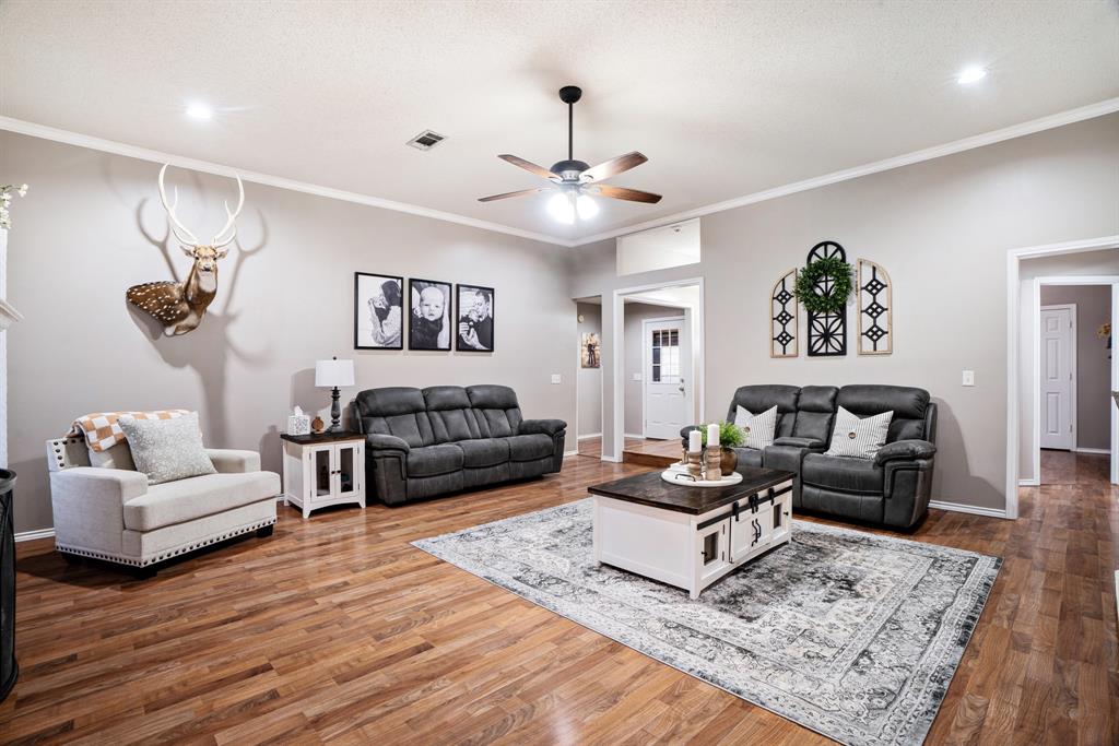 575 Mansfield Road Reno, TX 75462 - Photo 6 of 23 a living room with furniture and a rug