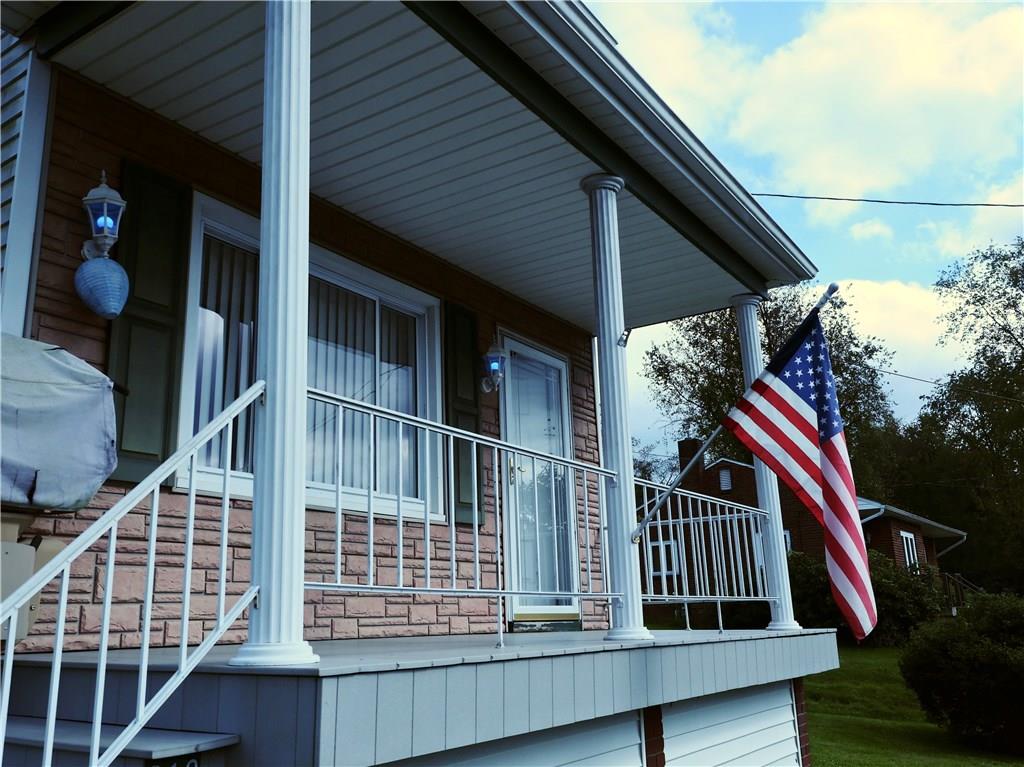 219 Pinchtown Road Pittsburgh, PA 15236 - Photo 3 of 25 Covered front Porch keep all you oncoming guest out of the weather.
