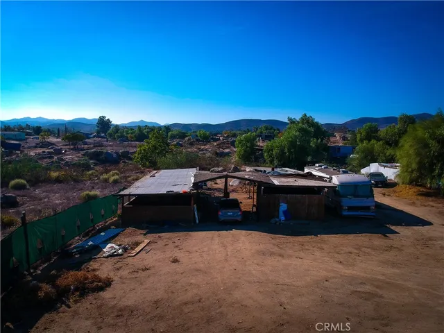 a view of outdoor space with swimming pool and mountain view