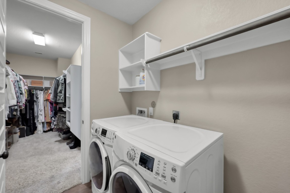 22202 Weller Oaks Drive Spring, TX 77389 - Photo 24 of 39 a utility room with dryer and washer
