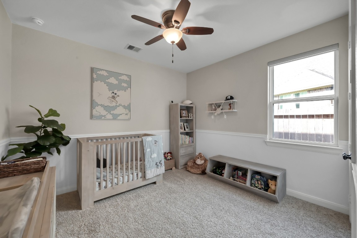 22202 Weller Oaks Drive Spring, TX 77389 - Photo 28 of 39 a room with furniture and a window