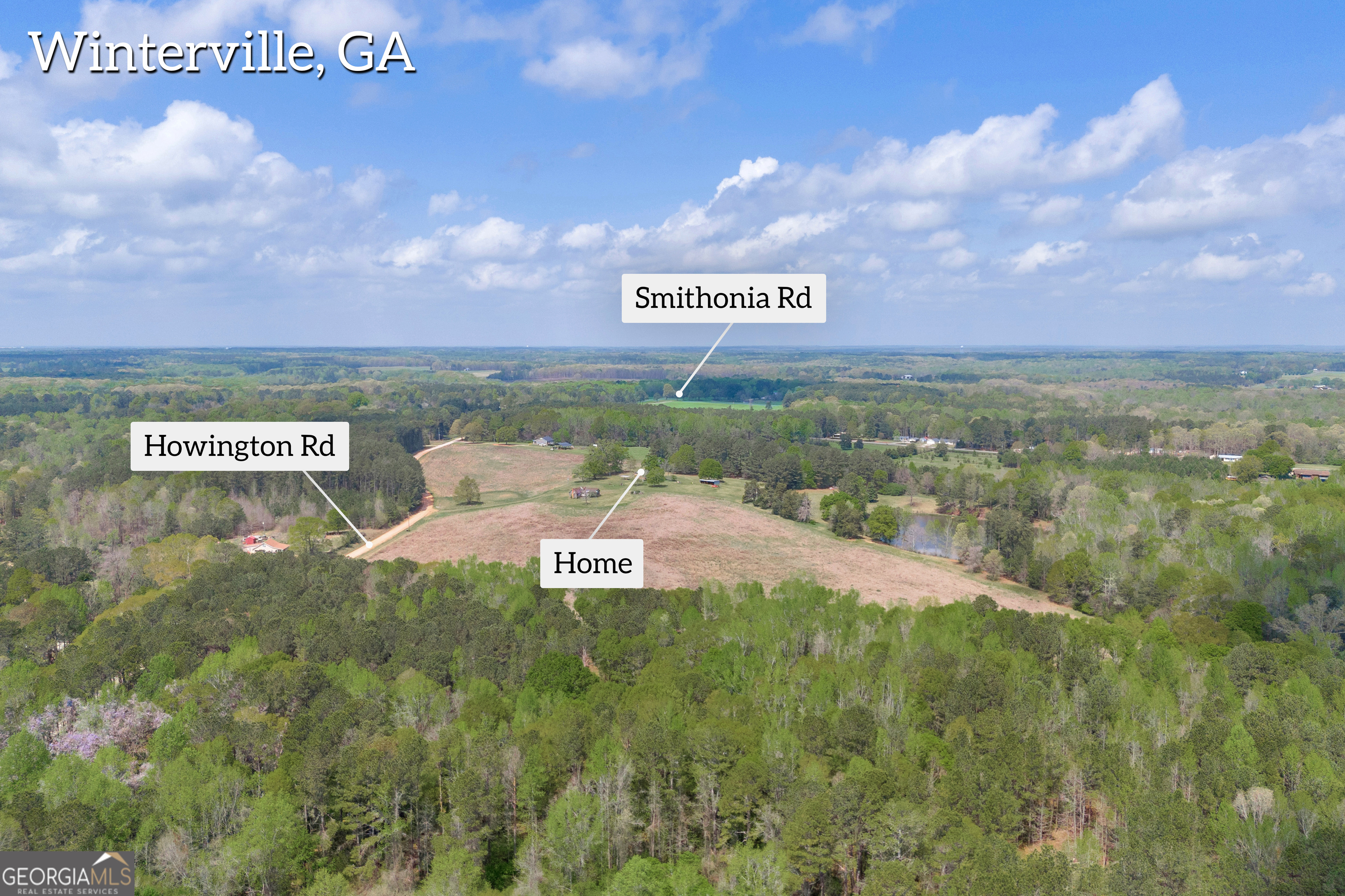 104 Howington Road Winterville, GA 30683 - Photo 11 of 74 a sign that is sitting in the middle of a field