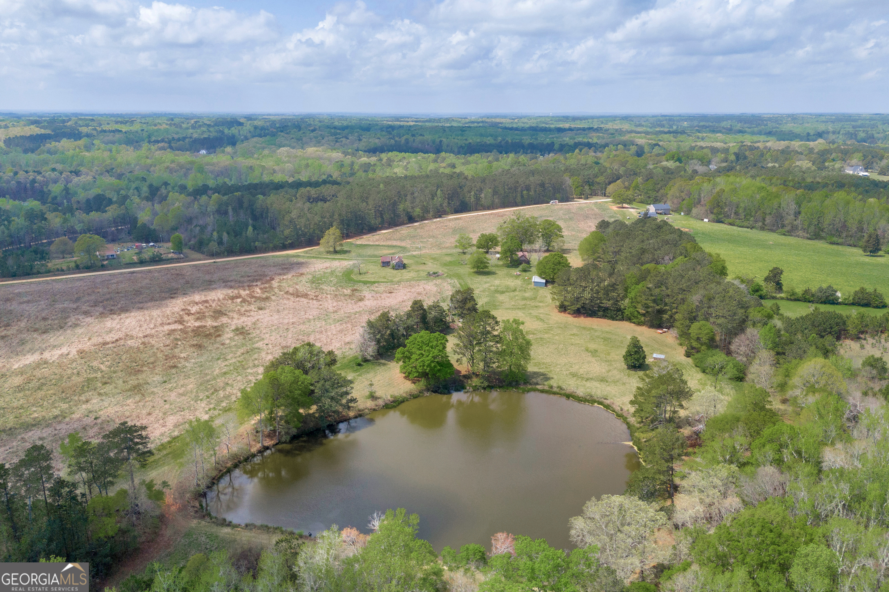 104 Howington Road Winterville, GA 30683 - Photo 20 of 74 a view of a lake in middle of the town