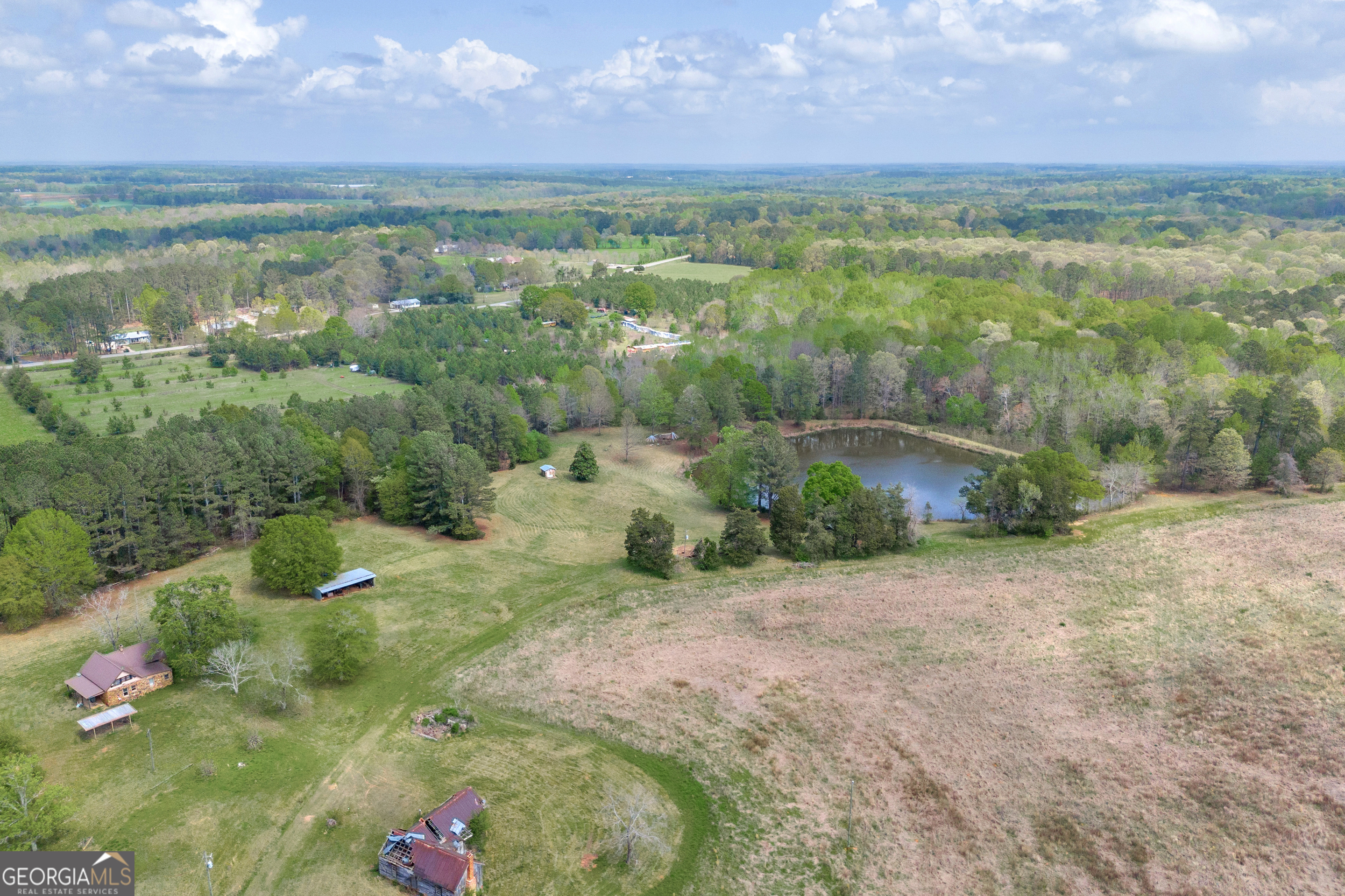 104 Howington Road Winterville, GA 30683 - Photo 2 of 74 a view of a street with an ocean view