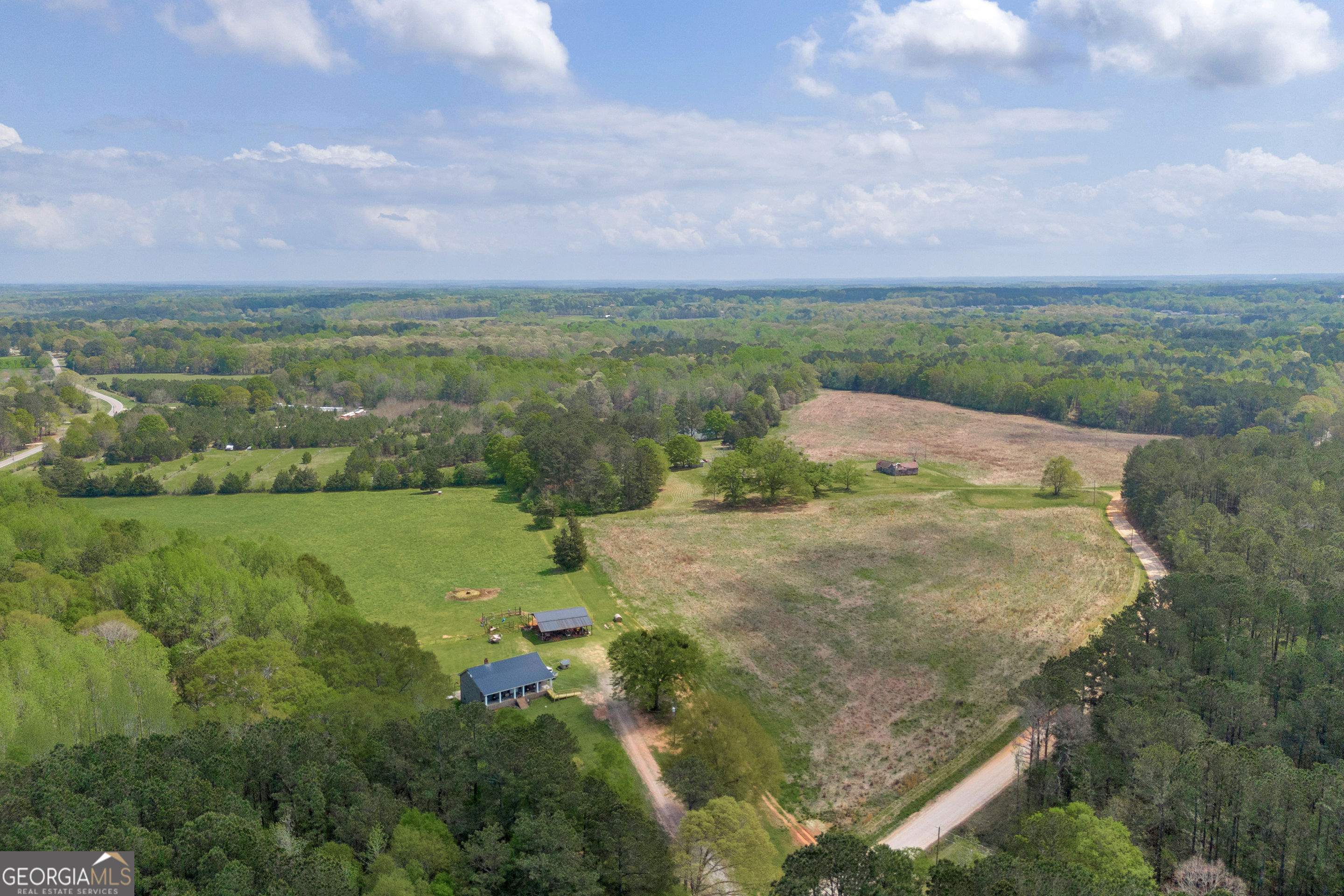 104 Howington Road Winterville, GA 30683 - Photo 29 of 74 a view of a field with an trees
