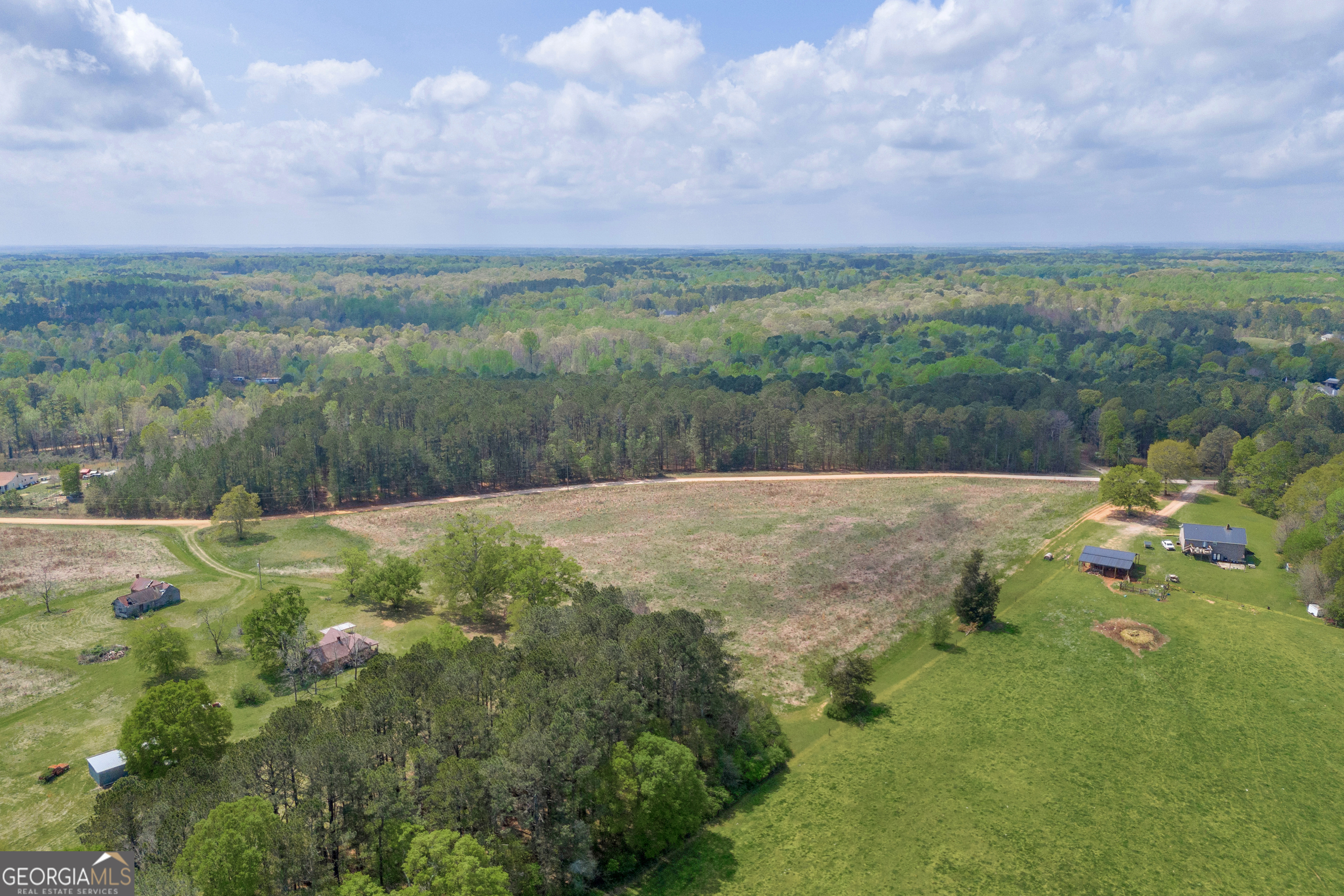 104 Howington Road Winterville, GA 30683 - Photo 31 of 74 a view of a lake with a yard
