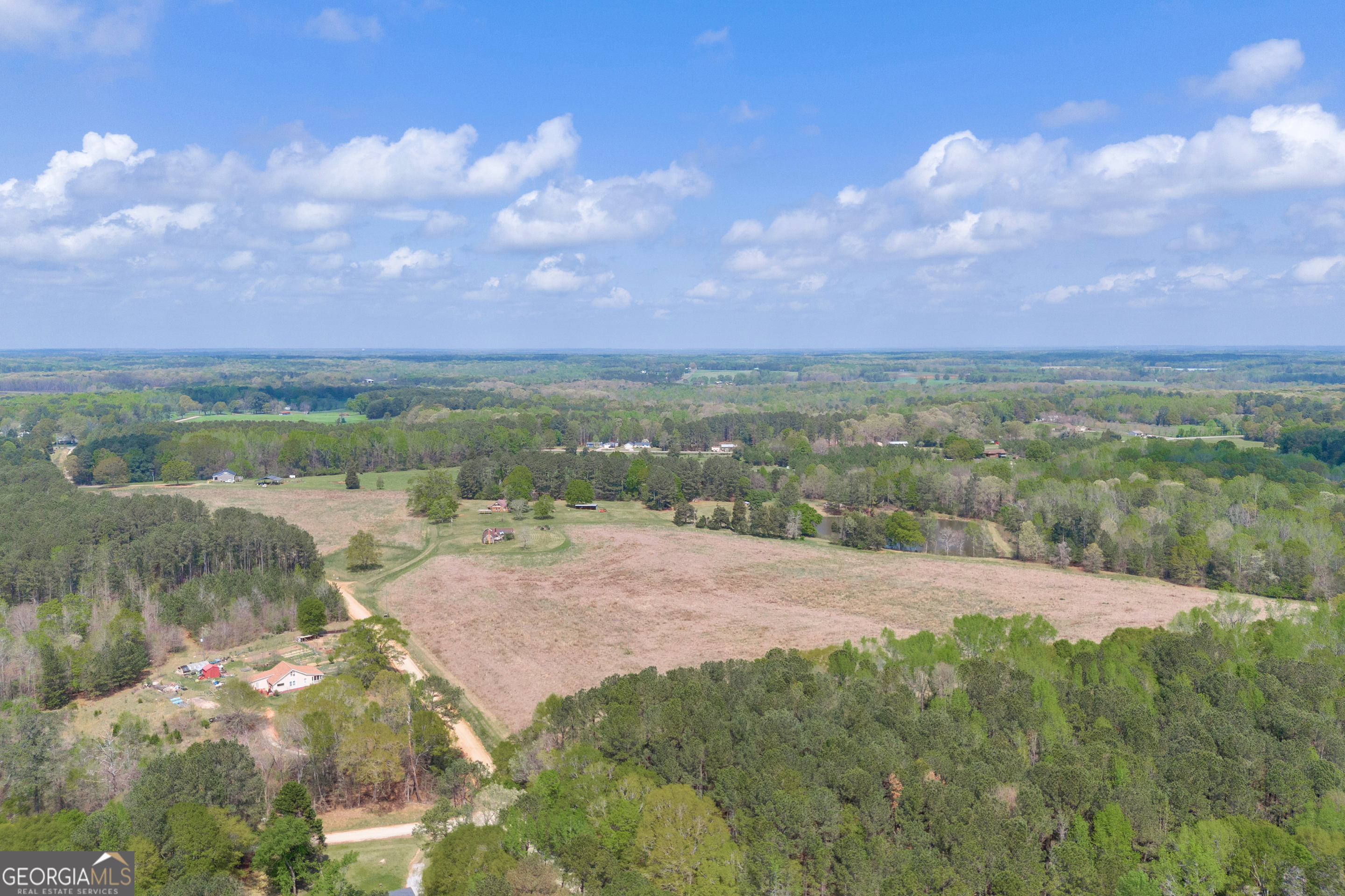 104 Howington Road Winterville, GA 30683 - Photo 35 of 74 a view of a lake from a yard