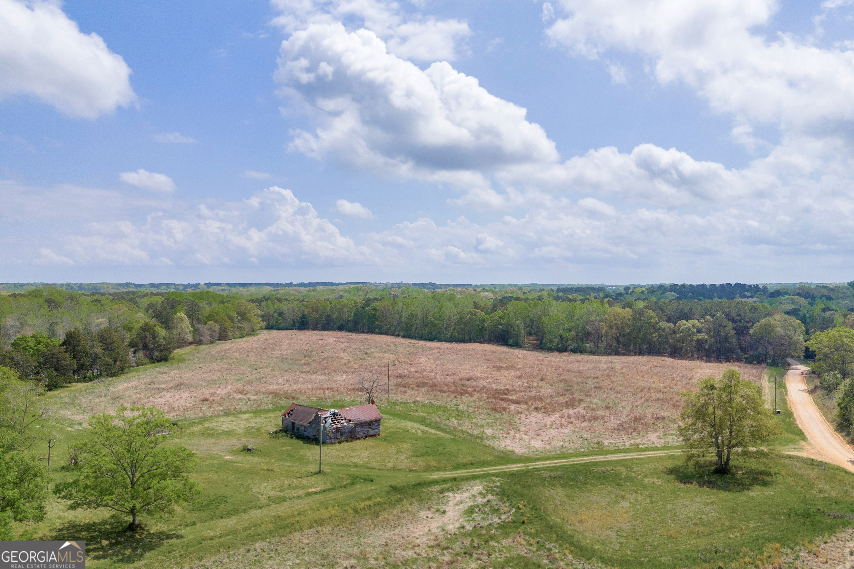 104 Howington Road Winterville, GA 30683 - Photo 44 of 74 a view of a lake with big yard