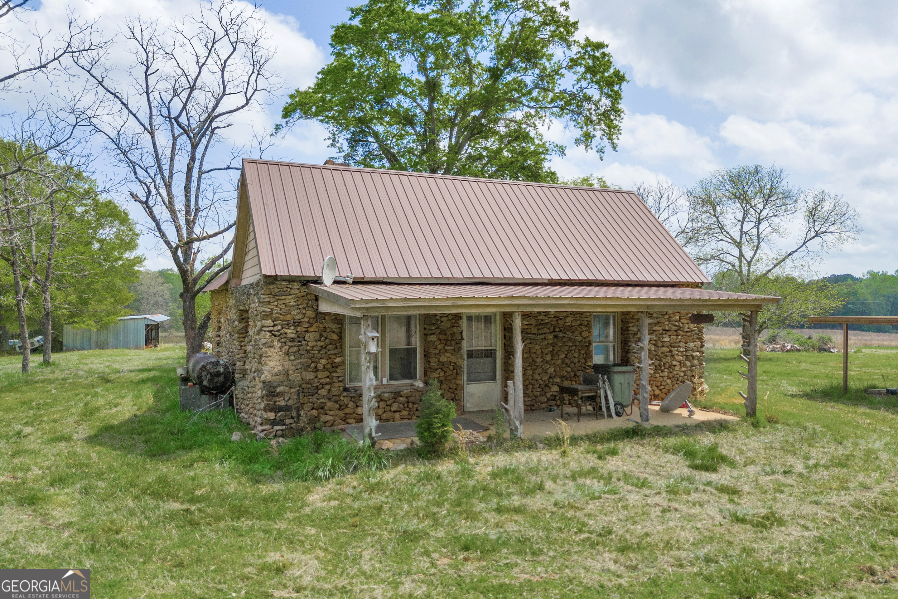 104 Howington Road Winterville, GA 30683 - Photo 66 of 74 a front view of a house with garden