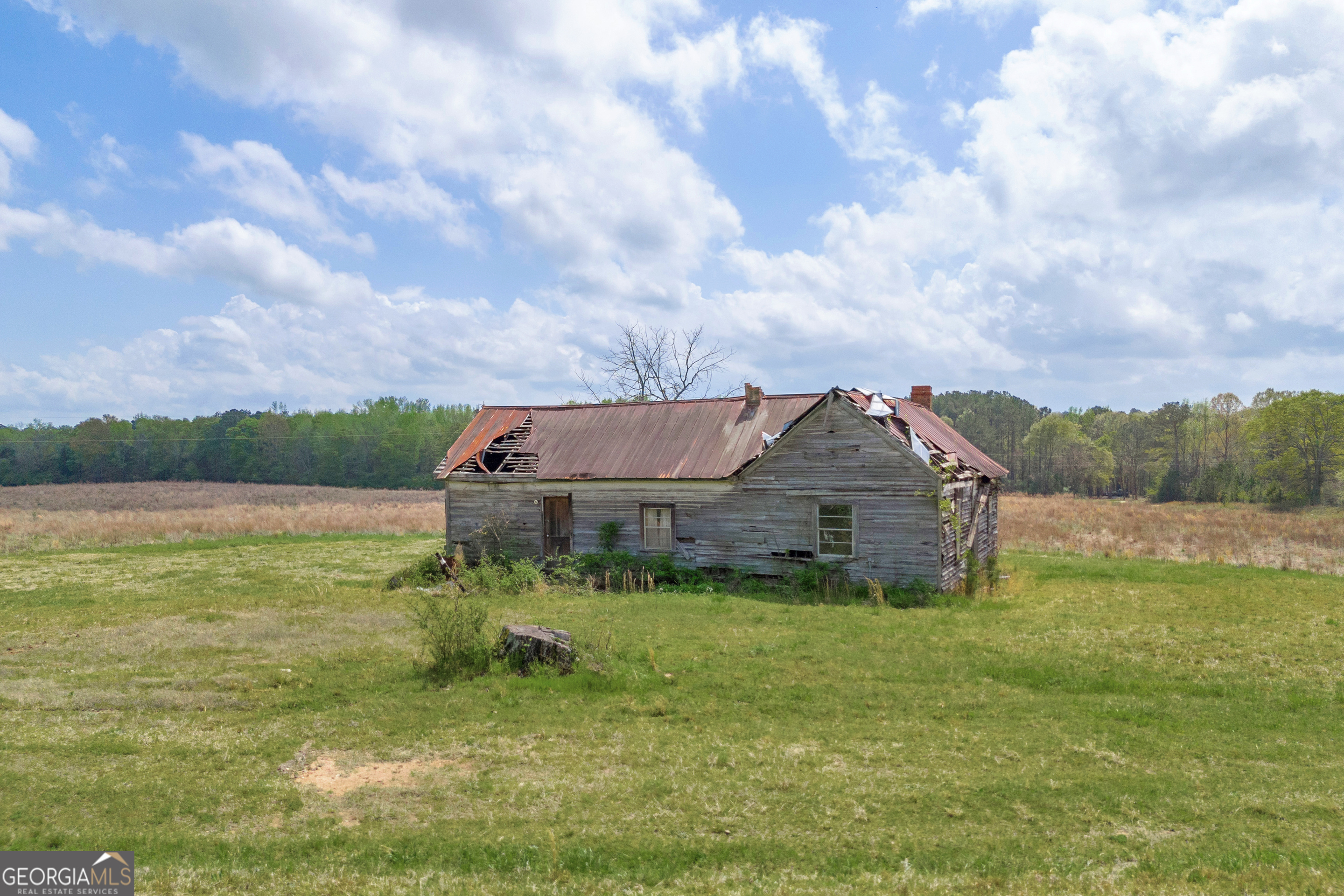 104 Howington Road Winterville, GA 30683 - Photo 70 of 74 a backyard of a house with lots of green space and mountain view
