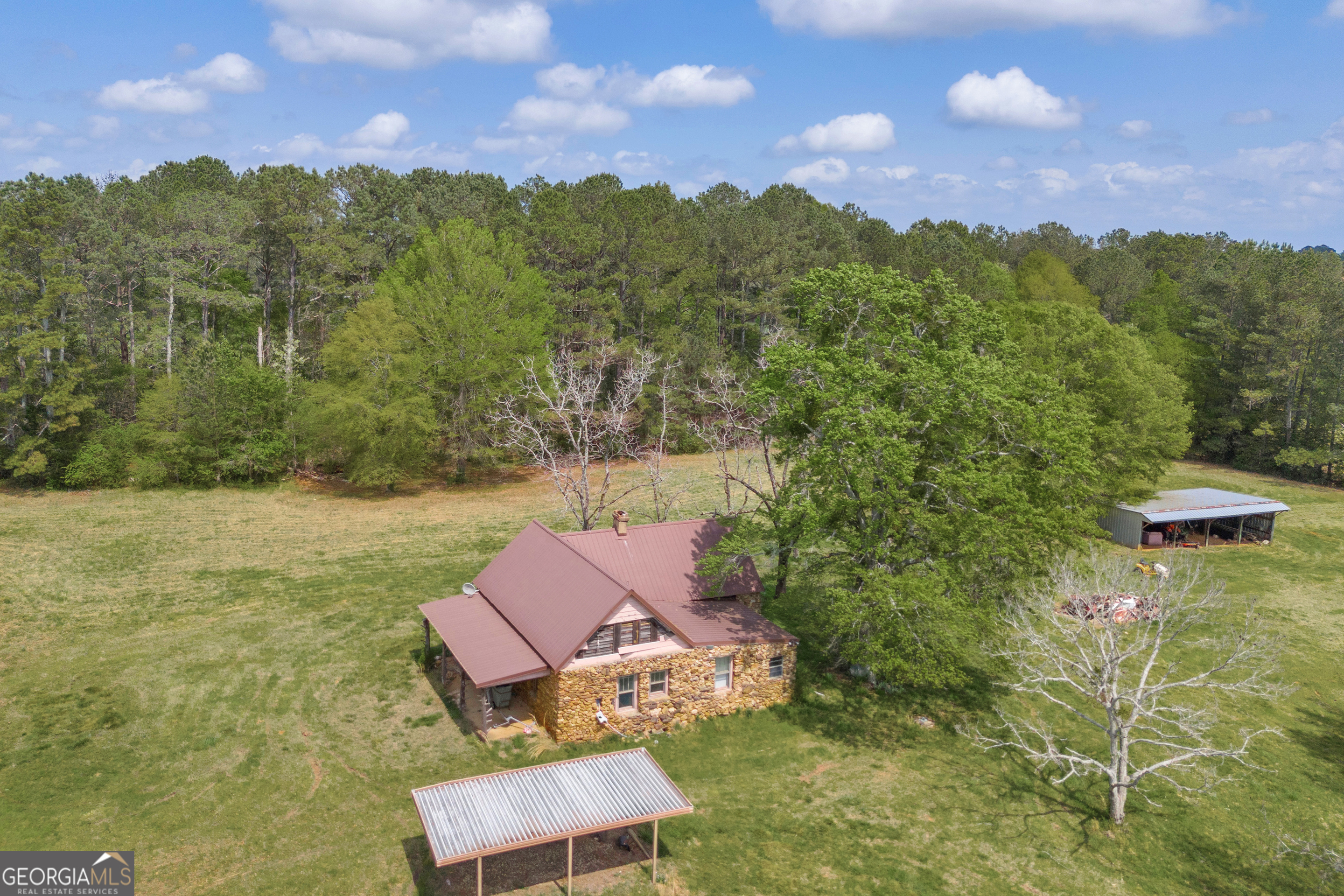 104 Howington Road Winterville, GA 30683 - Photo 71 of 74 a view of a lake with a yard