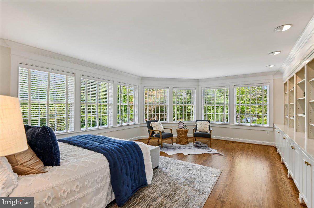 2700 Falling Timber Trail Edgewater, MD 21037 - Photo 39 of 89 a bedroom with a bed and wooden floor