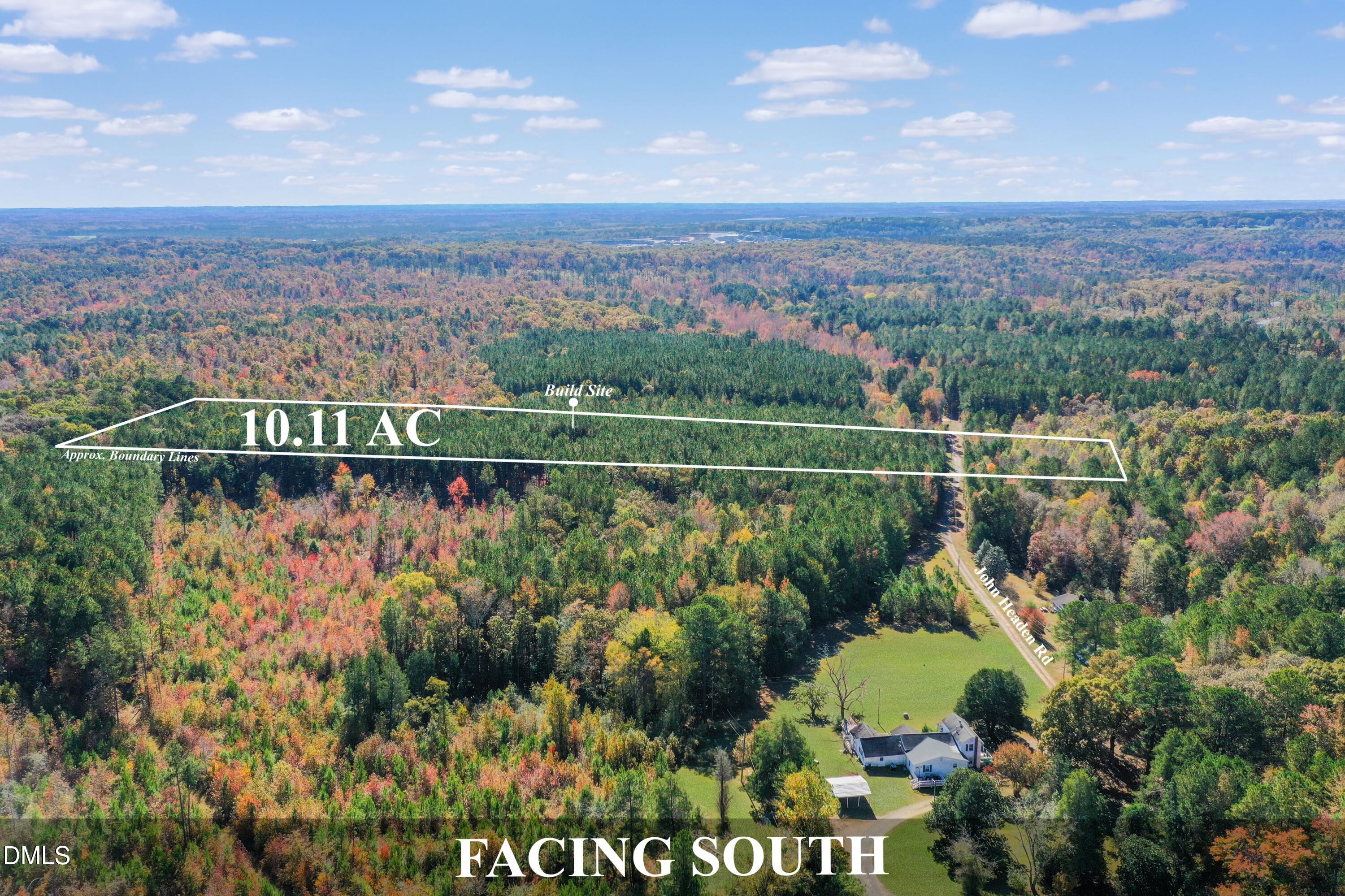 328 John Headen Road Moncure, NC 27559 - Photo 13 of 19 a view of a lake with a city