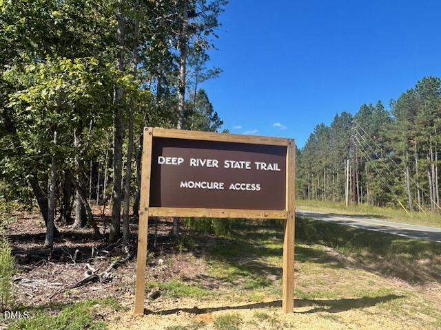 328 John Headen Road Moncure, NC 27559 - Photo 19 of 19 a sign broad in front of a road