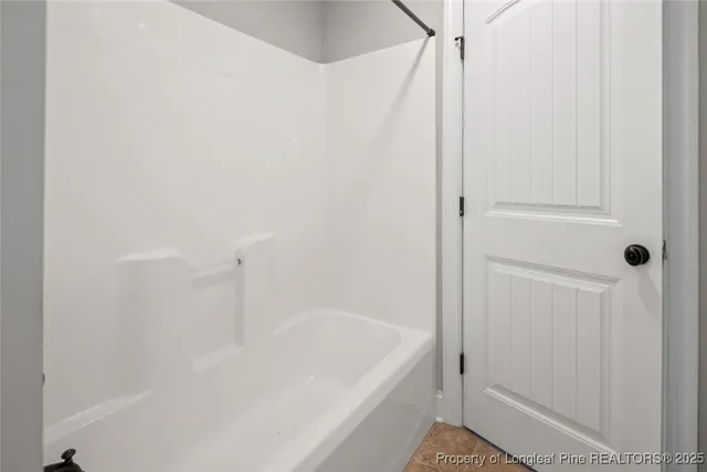a bathroom with a tub
